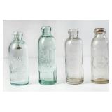 Lot of 4 Embossed Hutchinson Bottles