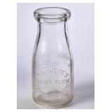 TL Jones Dairy, NC Embossed 1/2 Pint Milk Bottle