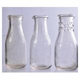 3 NC Embossed Round Pint Milk Bottles