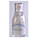 Davidson Creamery Embossed Round Pint Milk Bottle
