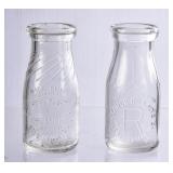 2 NC Embossed Round Clear Half Pint Milk Bottles