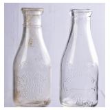 2 NC Embossed Round Clear Quart Milk Bottles