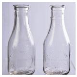 2 NC Embossed Round Clear Quart Milk Bottles