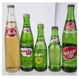 Lot of Soda Bottles with Product