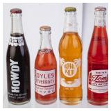 Lot of Soda Bottles with Product