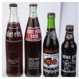 Lot of Soda Bottles with Product