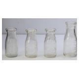 Lot of 4 Embossed NC Milk Bottles
