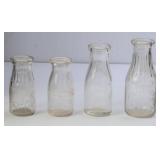 Lot of 4 Embossed NC Milk Bottles