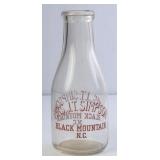 Mrs. J.T. Simpson Milk Bottle out of Black Mtn, NC