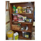 Contents Of Shelves And Fertilizer On Floor.