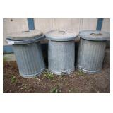 3 Galvanized Trash Cans, 4 Lids.