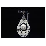 Sterling Silver & Carved Bone Moon Face Pendant,