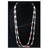 Long Strand Red, White, And Blue Cultured Pearls,