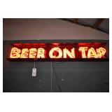 beer on tap neon sign