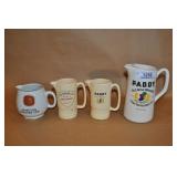 4 Irish Whiskey Pitchers.