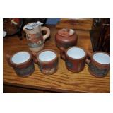 ceramic cups, pitcher and sugar jar