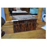 wooden box, peeling veneer.
