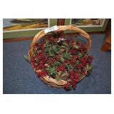 large basket with arrangement re berries.