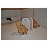 bear bookends, broken ear.