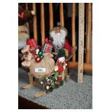 santa on his sleigh with a few hitchhikers.