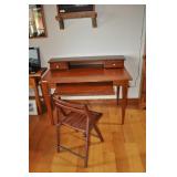 wooden desk and chair, keyboard drawer, top is