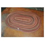 Medium Oval Braided Rug, Redish.