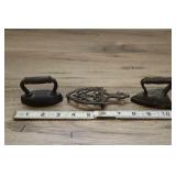 Pair Of Small Sad Irons And Trivet, Cast Iron,