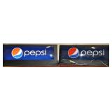Two Lighted Pepsi Signs