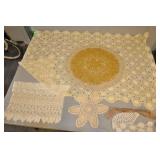 Assorted Doilies And Crochet Table Covering