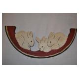 Wooden Sculpture Of Bunnies And Watermelon. Wooden Sculpture Of Bunnies And Watermelon.