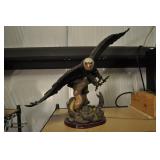 Bald Eagle With Open Claws Over Cobra Snake