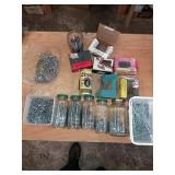 Nails assortment and Coors can.