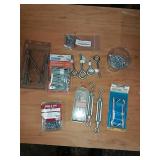 assorted lag screws, swing hooks, eye screws,