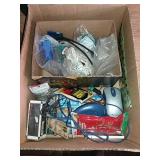 Assorted fasteners and office supplies.