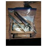 grease gun with four cartridges