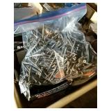 Assorted 3-1/2-4" deck screws. Gray and brown