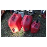 Three gas cans, 2gal, 5gal, 6gal