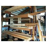 3 shelves of materials, plywood, trim molding,