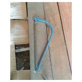 Blue hand saw.
