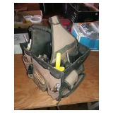 Square tool bag with assorted tools in it