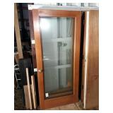 Wood and glass door 36 by 80.