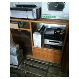 Solid wood entertainment center, on wheels.