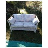 Wicker loveseat.