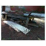 Assorted, wood stack, posts, planks and gutter.