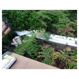 Gutter parts in the woods.