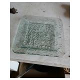 Pressed glass candle holder.