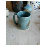 Glazed blue mug.
