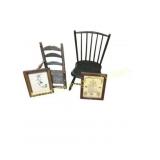 Two Wooden Chairs with Framed Artwork