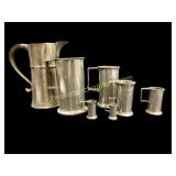 Seven Pewter Vessels