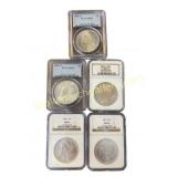 Five Graded Morgan Silver Dollars